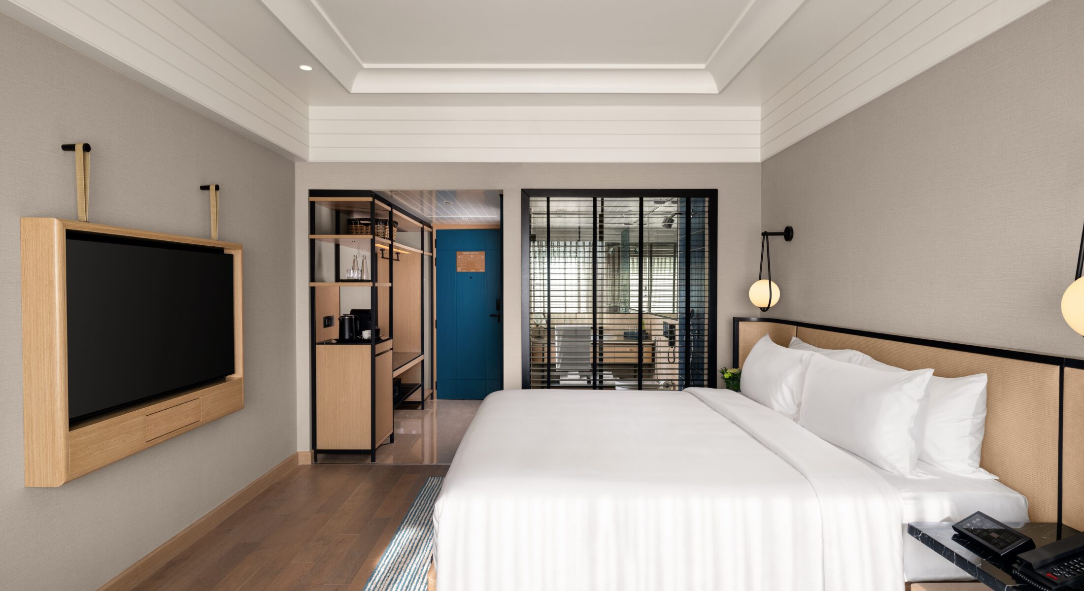 Superior Club Room with king-size bed, modern interiors, workspace, and Chennai city views at Pullman Chennai Anna Salai.